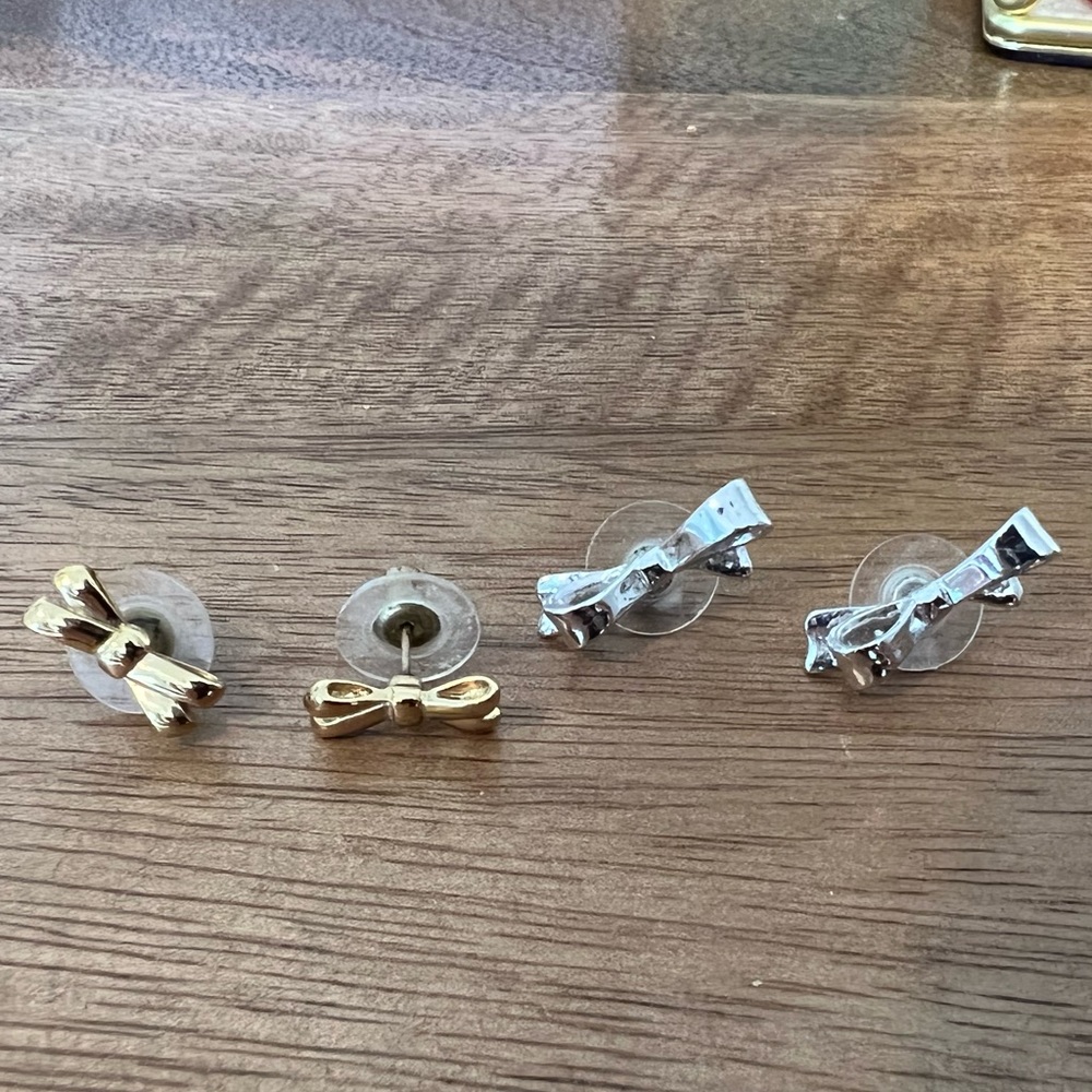Pair of Kate Spade Bow Earrings silver and gold